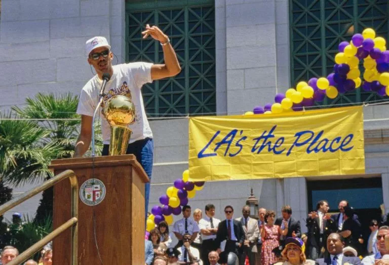 Kareem Abdul-Jabbar celebrates with the Larry O'Brien Championship Trophy